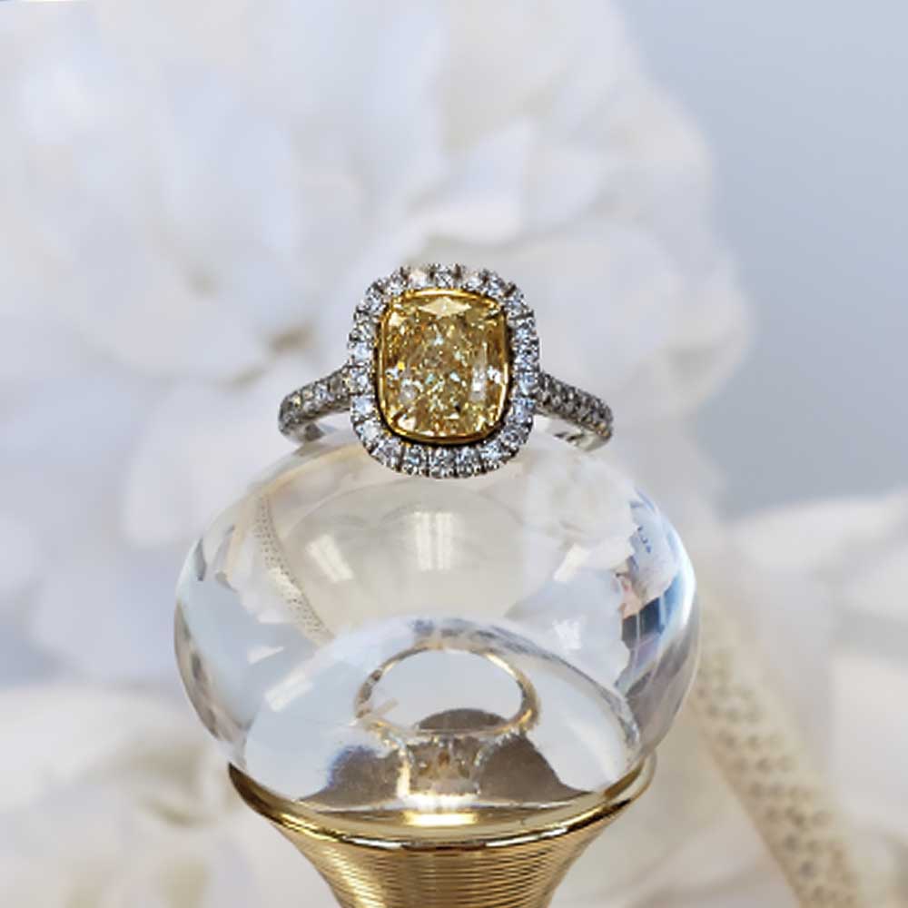 yellow diamond ring with white diamond halo